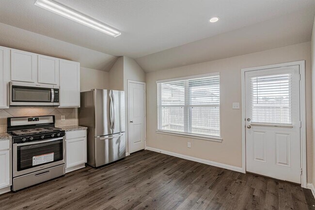 Building Photo - 4922 Blue Jacaranda Wy