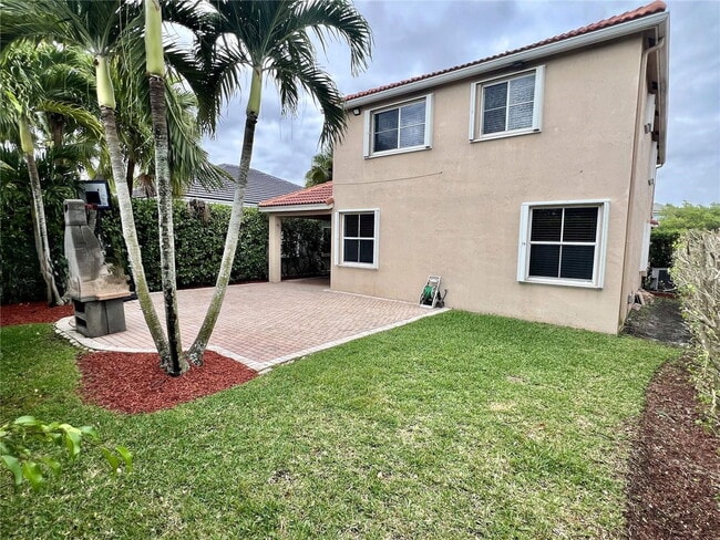 Building Photo - Tupelo Way, Weston, FL 33327 - 4 BR 2.5 BA single-family home