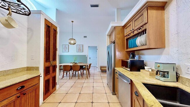 Building Photo - 11805 W Fisherman Ln