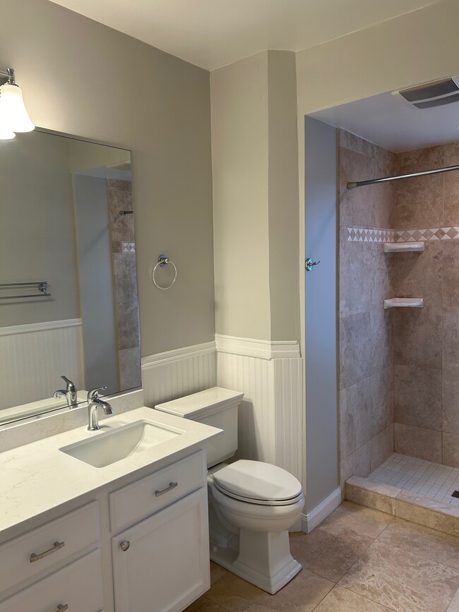 Bathroom features a large walk-in tile shower - 3720 S L St