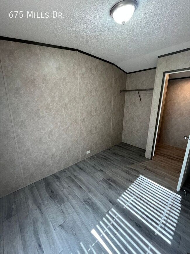 Building Photo - 675 E Mls Dr