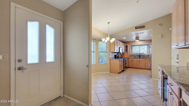 Building Photo - 8817 E Dahlia Dr