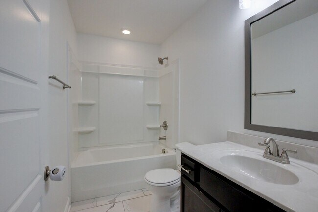 Building Photo - Fresh and so Clean Clean Close to Everything!