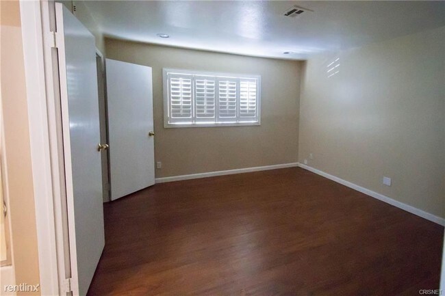 Building Photo - 4 br, 4 bath House - 6936 Encino Ave