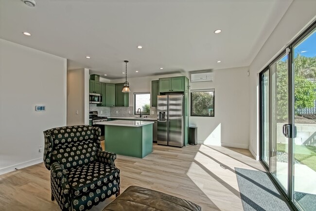 Building Photo - Beautifully Remodeled, Bright & Modern 4BR3BA Home w/ 2BR1BA Guest House On Sprawling Corner Lot ...