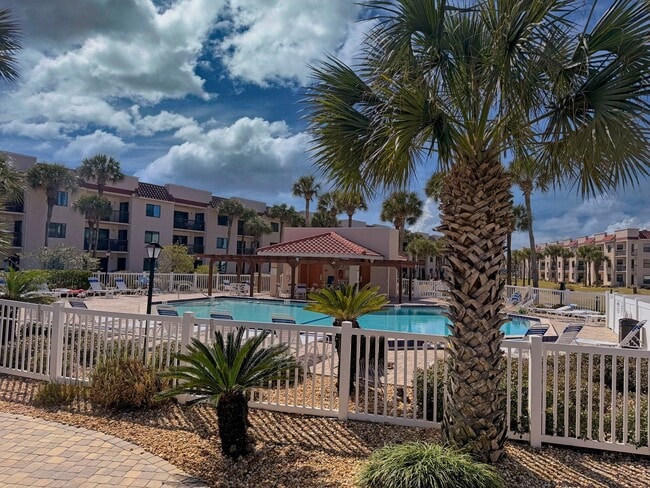 Building Photo - Beautifully Renovated, Fully Furnished Beach Condo just a short walk from the ocean.