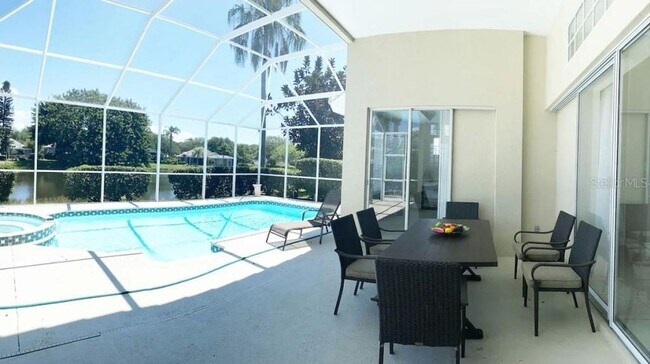 Building Photo - Rent a luxurious golf course lifestyle home in Sarasota, FL