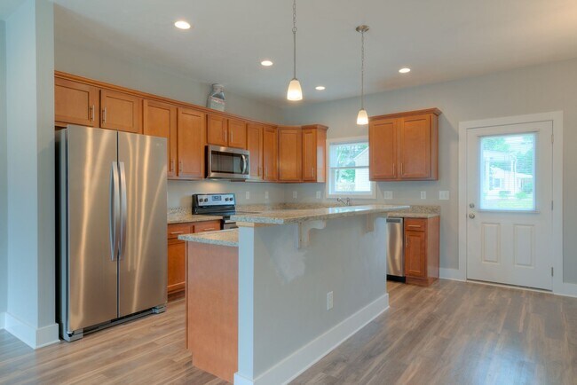 Building Photo - Private Bedroom in a Shared Two-Bedroom In Uptown Village