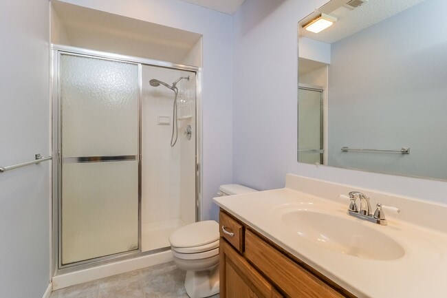 Building Photo - Shawnee Townhome with Tree Line Views and Three Levels of Living