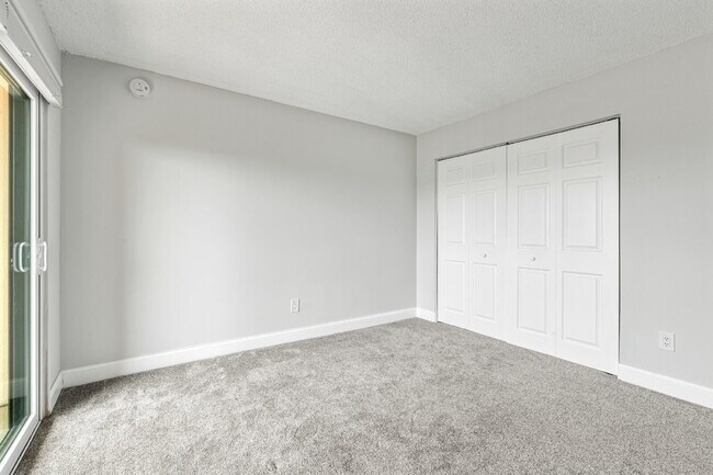 Building Photo - NEWLY RENOVATED TWO BEDROOM CONDO IN WATERFRONT RESORT STYLE COMMUNITY