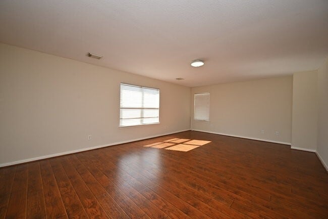 Building Photo - 9403 Coatsworth Dr
