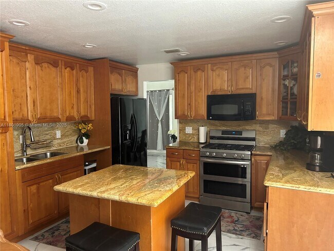 Building Photo - 1450 NW 129th Ave