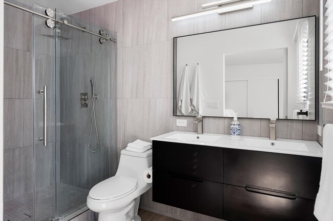 Building Photo - Furnished - Catch the Wave of Modern Comfort at Our Reef Oasis