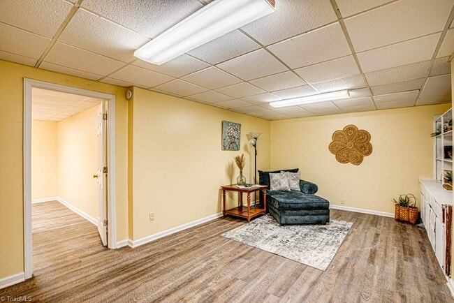 basement living area - 2672 Windy Xing