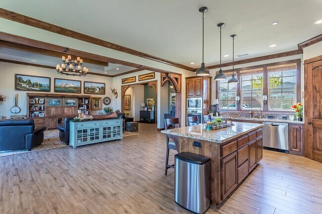 Building Photo - Custom Home with Solar, a Pool & all the Upgrades...in Town...Must See!