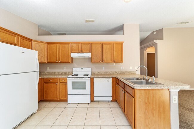 Building Photo - Peaceful 3-Bedroom Home with Open Floor Plan & Two-Car Garage in Rainbow Lakes Estates!