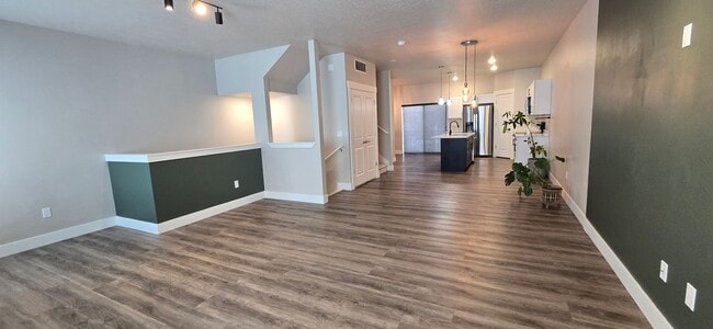 Building Photo - Come check out this beautiful 3 story town...