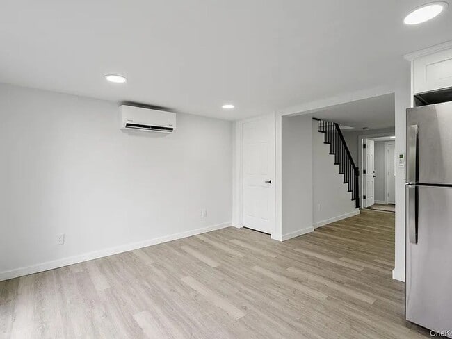Building Photo - Fully Renovated 3BR Retreat on Highland La...