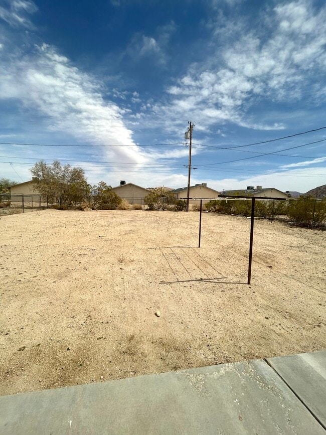 Building Photo - 6547-6549 49 Palms Ave