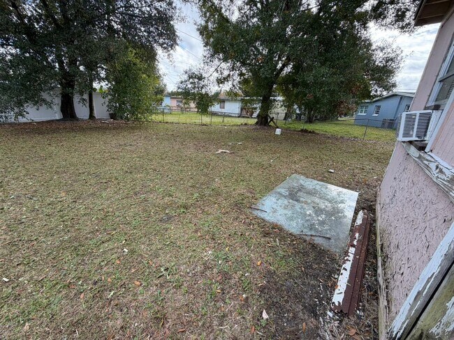 Building Photo - Spacious 4BR Home in Orlando – Move-In Ready with Parking & Great Location!