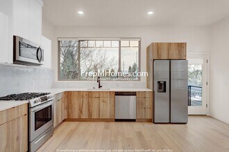 Building Photo - Two Bedroom Modern Oasis with Stunning Views & Designer Finishes