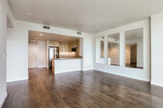 Building Photo - Gorgeous 1 Bedroom Condo with Floor to Cei...
