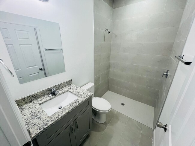 Building Photo - BRAND NEW CONSTRUCTION- ONE OF A KIND-ONE BEDROOM, ONE BATH-ONE CAR GARAGE- LEHIGH ACRES