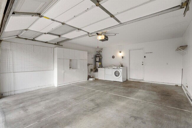 Building Photo - Charming and spacious single-story townhome nestled within a gated community in the desirable Nor...
