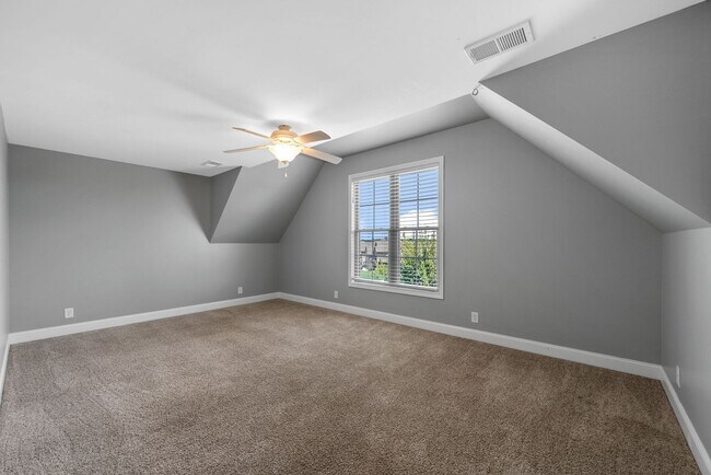 Building Photo - Elegant 4-Bedroom Home with Vaulted Ceilin...