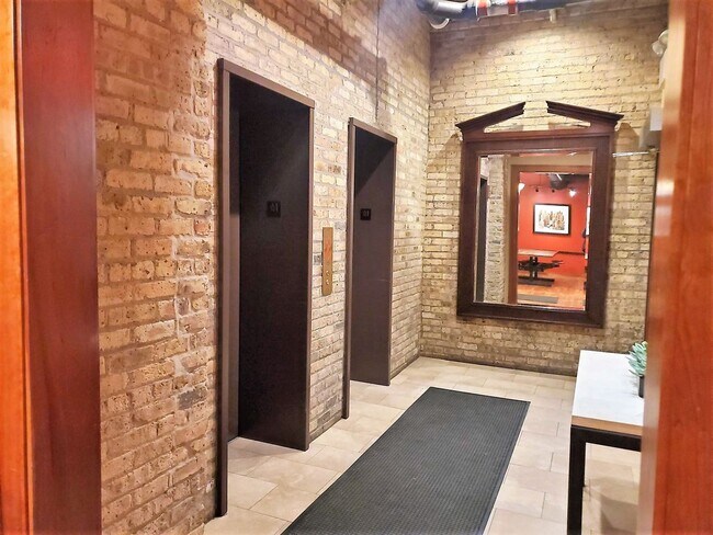 Building Photo - Lakefront Loft in a Historical Building with Every Convenience