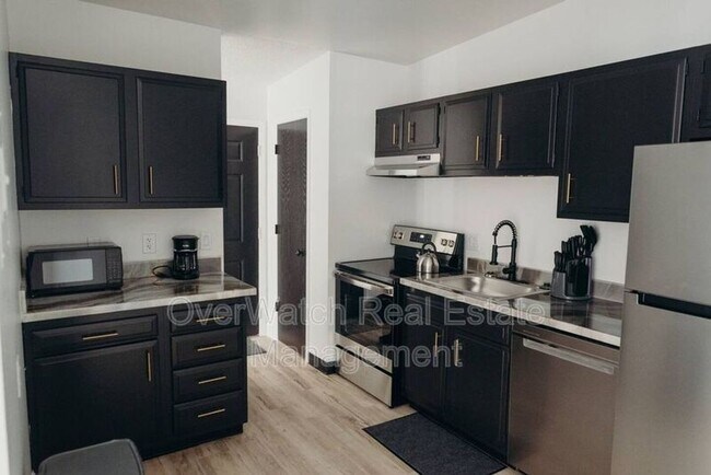 Building Photo - 3009 W 33rd Ave