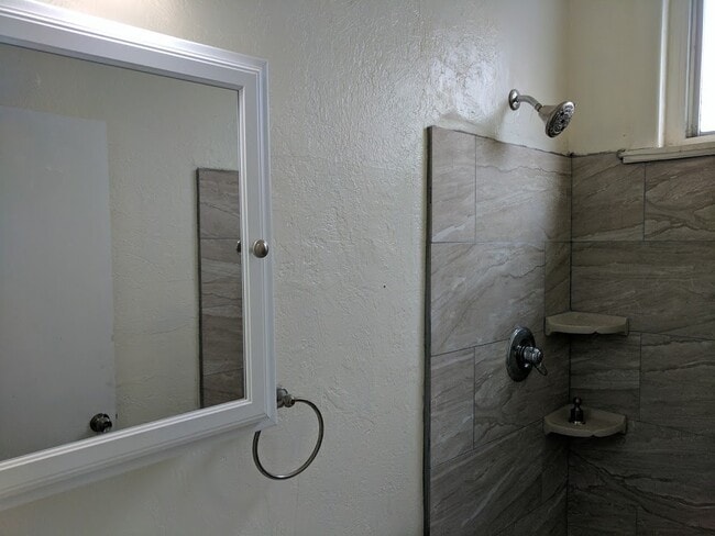 Building Photo - Check out this Totally Updated First Floor Duplex! 2BR+Den