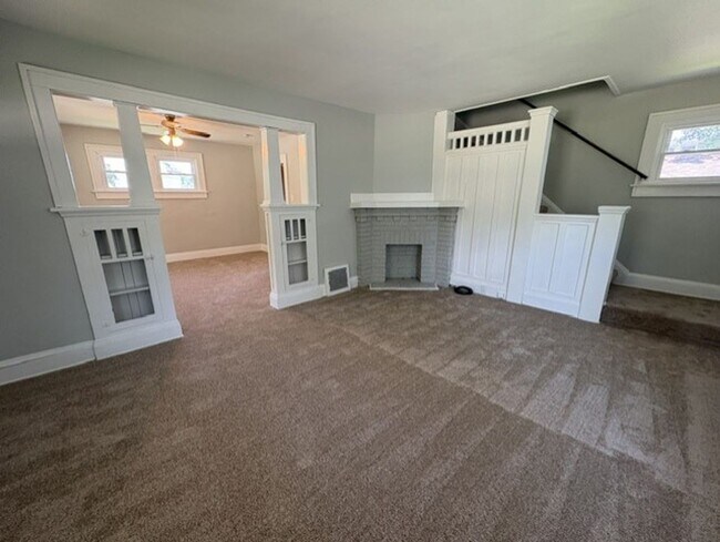 Building Photo - Comfortable Akron Home with Covered Front Porch, Dining Room & 2-Car Garage