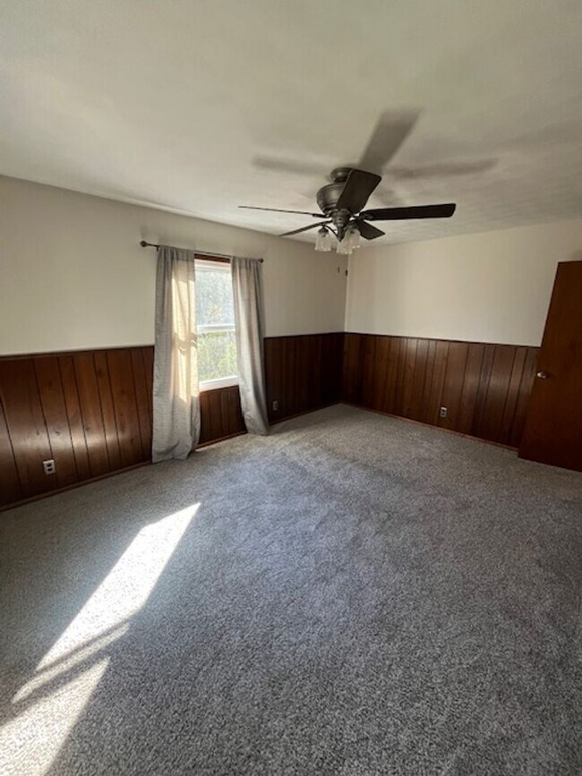 Building Photo - Spacious, Fully Updated Home with Walkout Basement on a Mature Lot