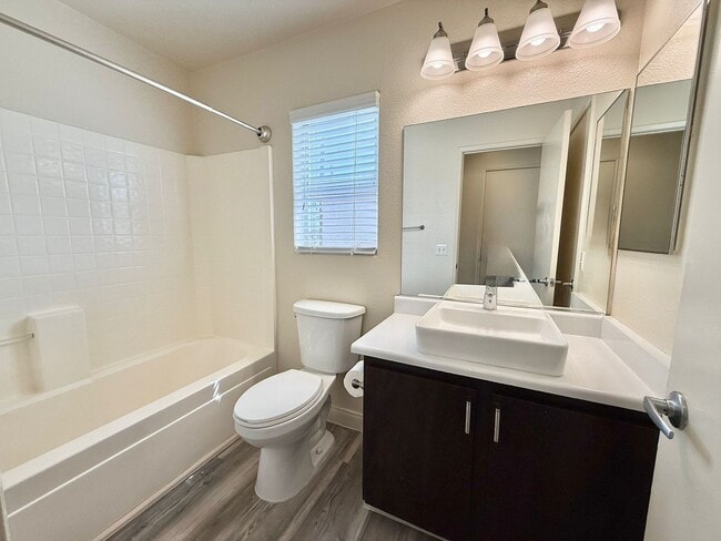 Building Photo - Stylishly Home in Gated Community – Minute...