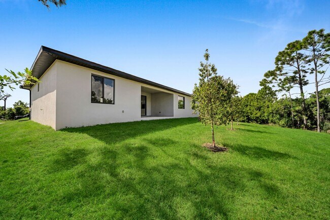 Building Photo - Single family for rent in Port Charlotte. New construction. 3+Den/ 2 bath. City water.