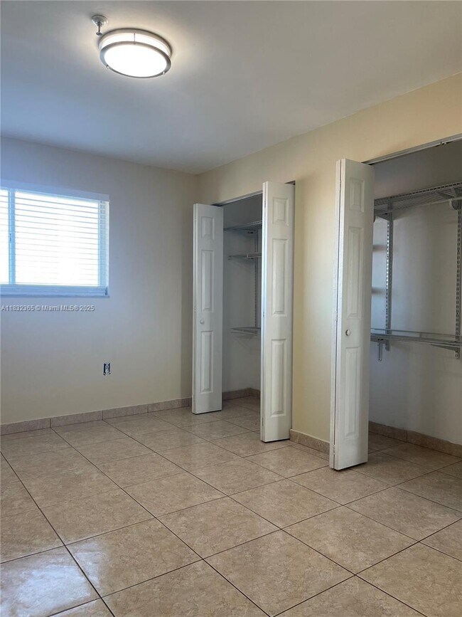 Building Photo - 7935 W 30th Ct