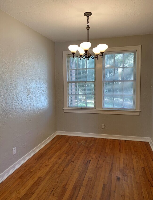 Building Photo - Charming Corner-Lot Home with Huge Fenced Yard & Detached Garage