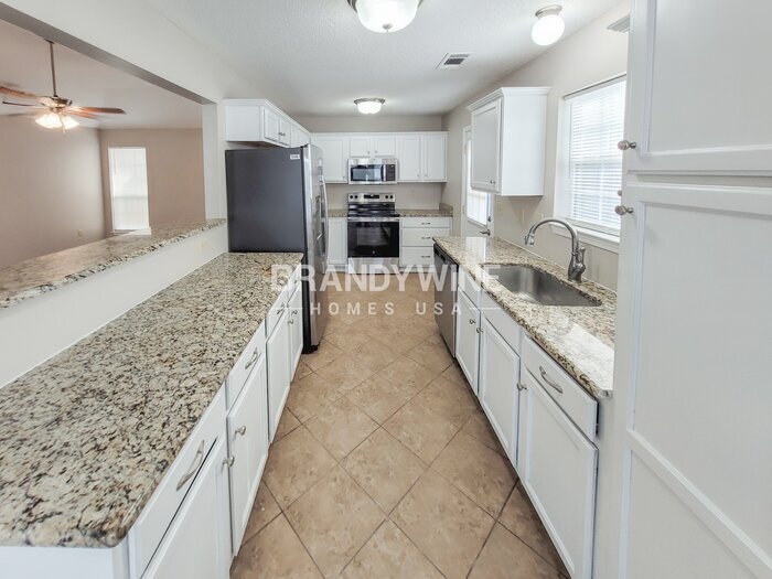 Building Photo - 7123 Amberly Way Dr