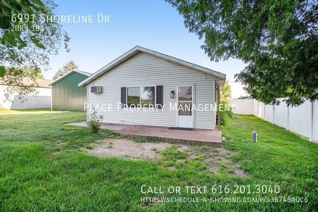 Building Photo - 6991 Shoreline Dr
