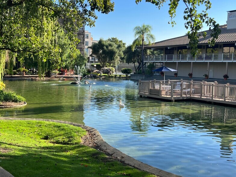 Pond and clubhouse - 310 N Civic Dr