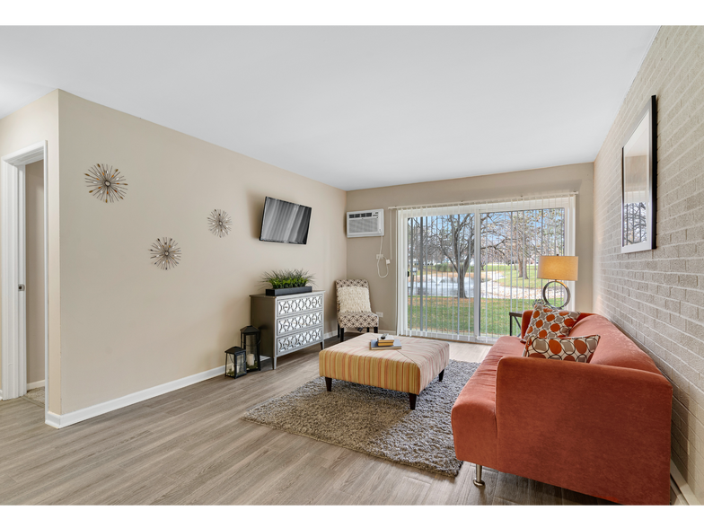 Living Room & Sliding Glass Door | Apartments For Rent in Mount Prospect Illinois | The Element - The Element