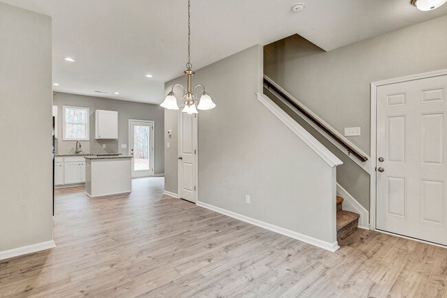 Building Photo - 4 Bedroom Townhouse for Rent in Clayton NC | Garage | Pet Friendly | Wooded View! | MOVE IN SPECI...