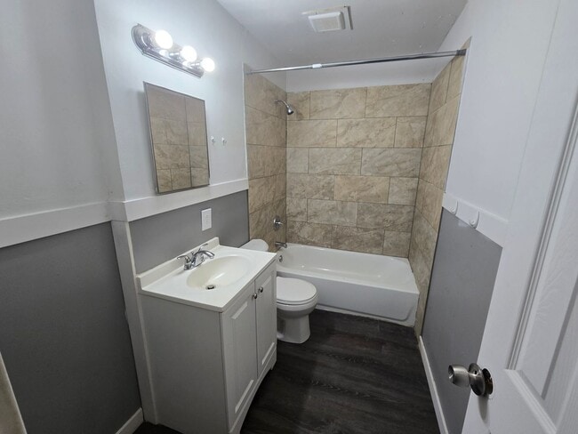 Building Photo - 3 bed 1 bath W/ back yard bunker!