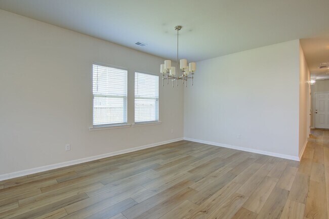 Building Photo - Spacious 4BR Rental with Stunning Kitchen & Covered Patio
