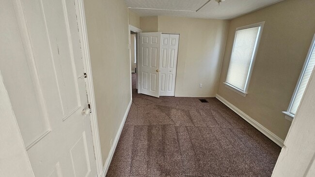 Building Photo - JUST REDUCED!  Ask About Move In Incentives!  3 Bedroom Duplex in Quiet Location