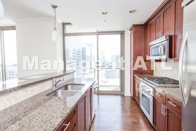 Building Photo - The Atlantic - Luxury living Intown Condom...