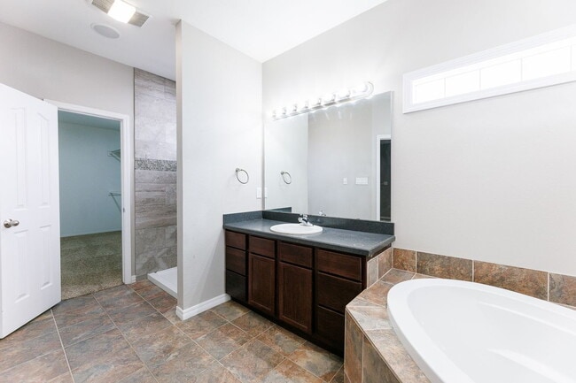 Building Photo - Spacious 3-Bedroom in Gated Community