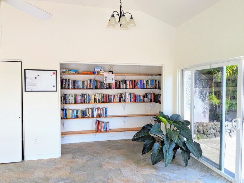 On-site community room library - 75-6081 Alii Dr