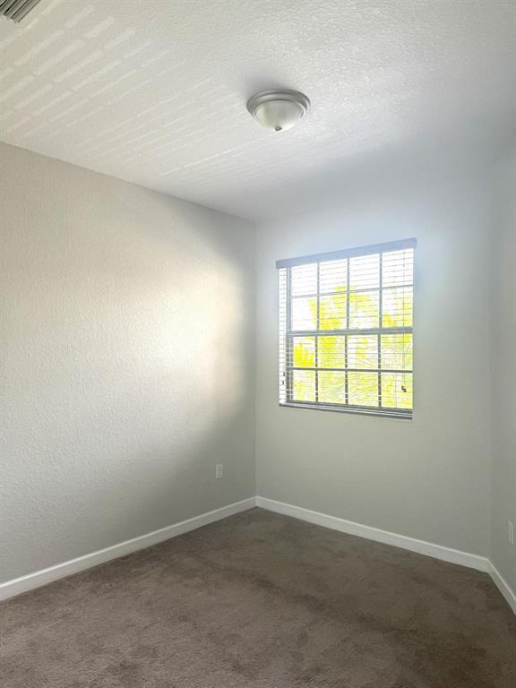Building Photo - 5887 NW 56th Pl